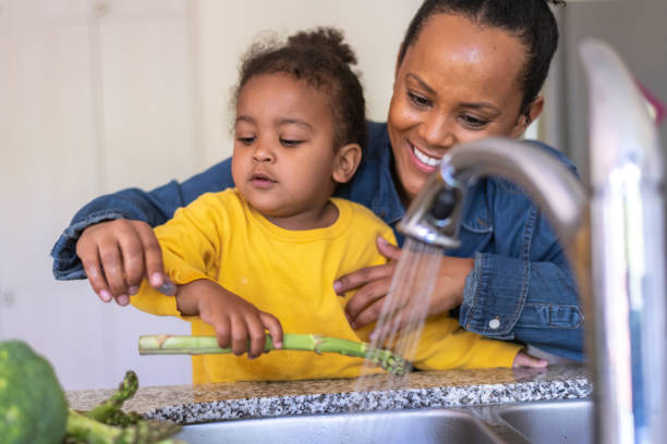 istock Mother and son work in the kitchen together 1279240598