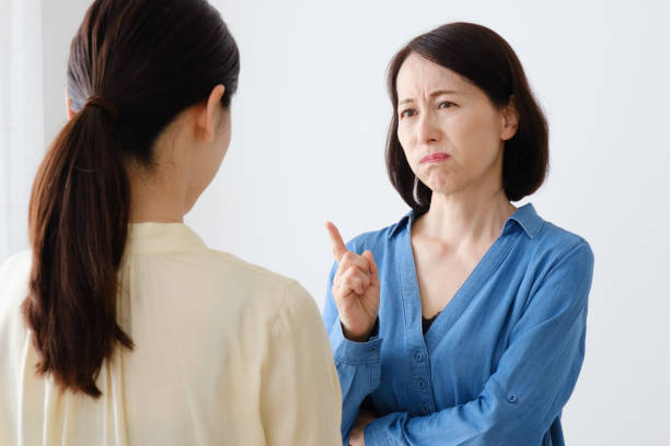 asian mother and daughter talking