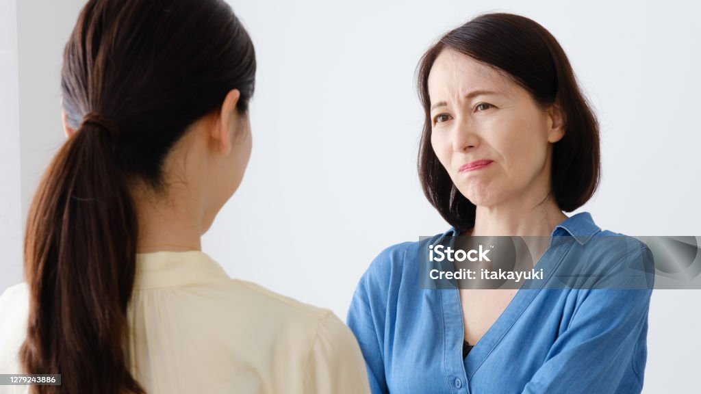 asian mother and daughter talking Japanese Ethnicity Stock Photo