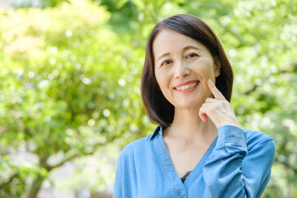 istock attractive middle asian woman relaxing at park 1279246320