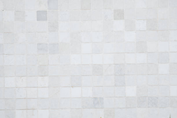 istock Closeup shot of white wall tile pattern. Tile pattern of white and gray as background. 1279246464