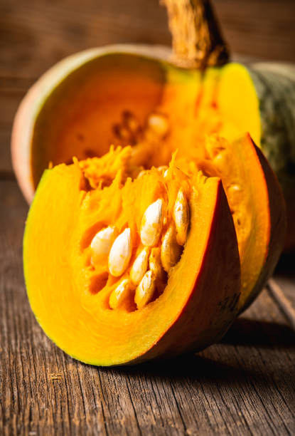 istock Freshly harvested pumpkin sliced on the kitchen table 1279257105