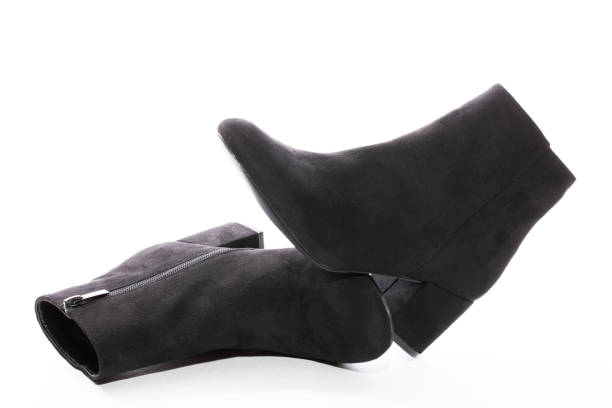 istock Women's boots with high heels on a white background 1279257769