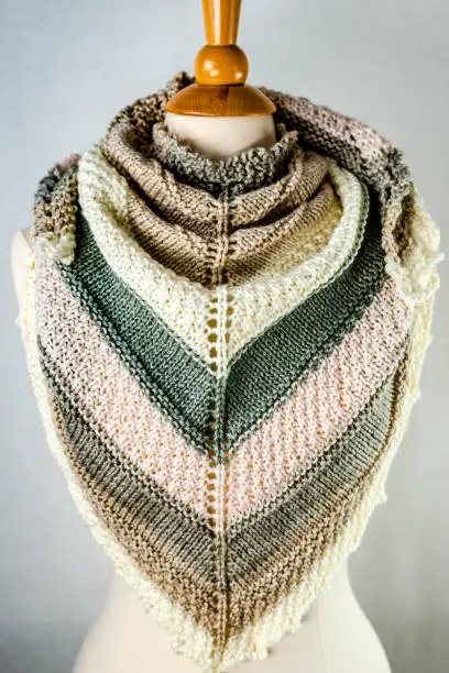 Multicolor knitted scarf with the ornaments