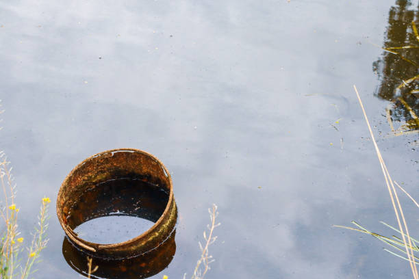 istock old oil drum floating in water 1279260517