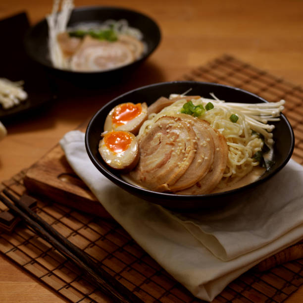 Traditional Japan noodle, Tonkotsu ramen with sliced pork and eggs and pork bone based soup