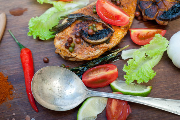 istock wood fired hoven cooked chicken breast on wood board 1279263732