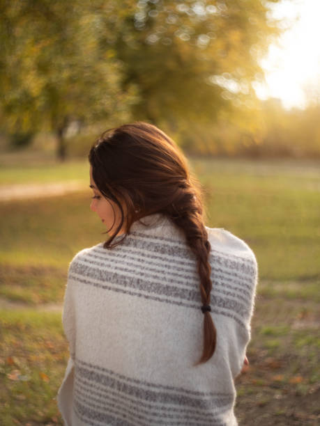 istock Woman in Autumn Park 1279269470