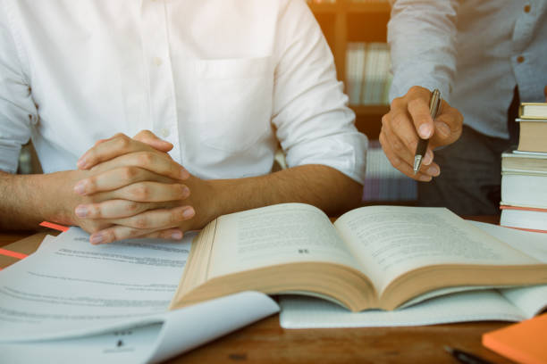 istock Teenager studying at desk and doing homeworks 1279272927