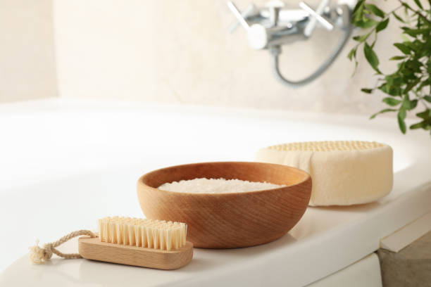 istock Bath with personal hygiene accessories in light beige bathroom 1279273606