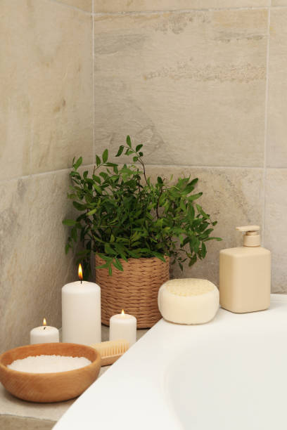 istock Bath with personal hygiene accessories in light beige bathroom 1279273634