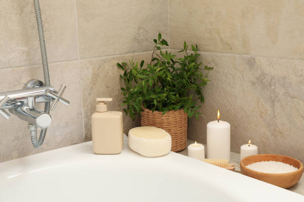 istock Bath with personal hygiene accessories in light beige bathroom 1279273661