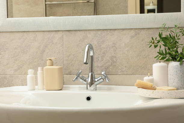 istock Sink and personal hygiene accessories in bathroom 1279273797