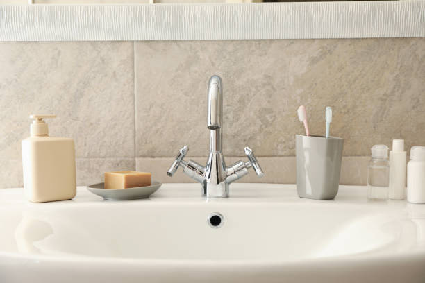 Elegant hotel bathroom,clean white towels and lavatory