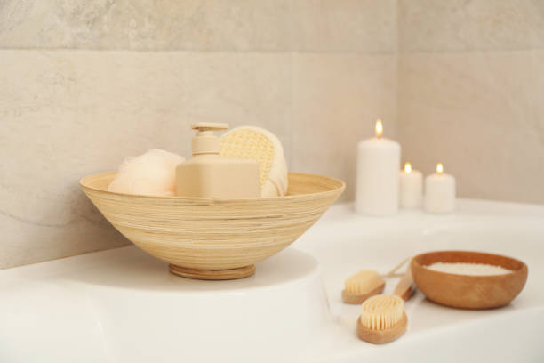 istock Bath with personal hygiene accessories in light beige bathroom 1279273848