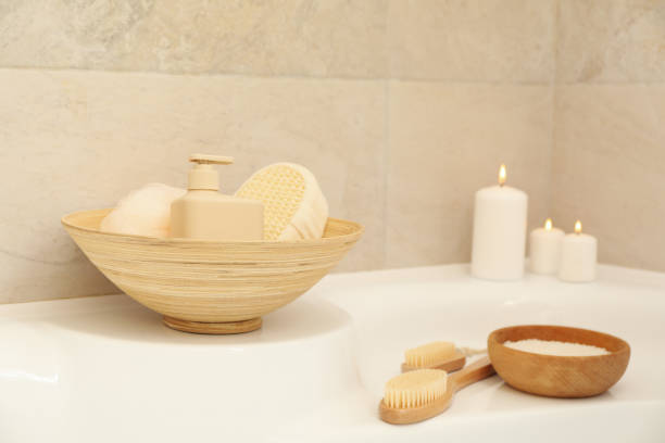 istock Bath with personal hygiene accessories in light beige bathroom 1279273880