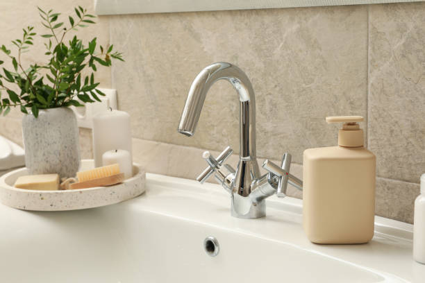 istock Sink and personal hygiene accessories in bathroom 1279273887