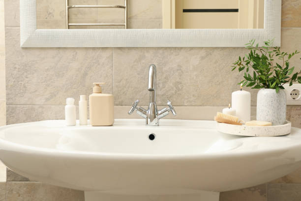 istock Sink and personal hygiene accessories in bathroom 1279273953