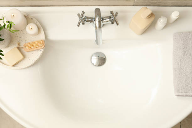 istock Sink and personal hygiene accessories in bathroom 1279274637