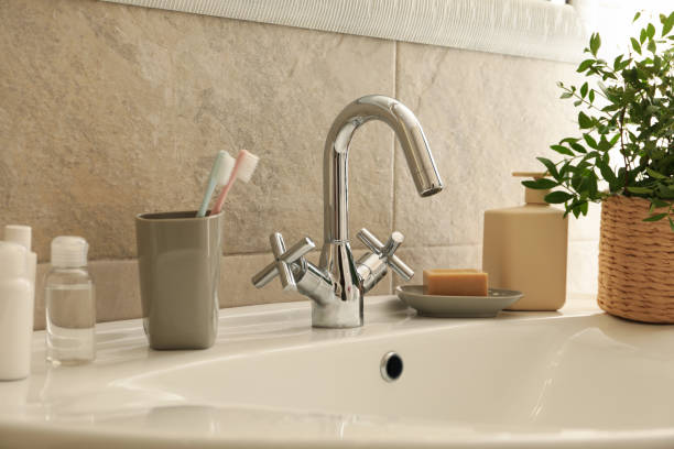istock Sink and personal hygiene accessories in bathroom 1279274671