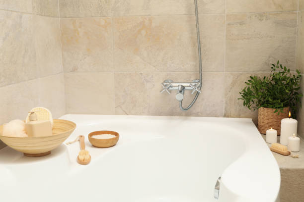 istock Bath with personal hygiene accessories in light beige bathroom 1279274839
