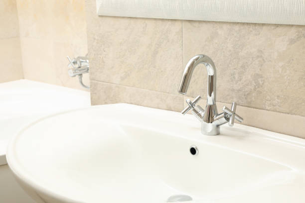 istock Sink in modern comfortable bathroom in light beige color 1279274993
