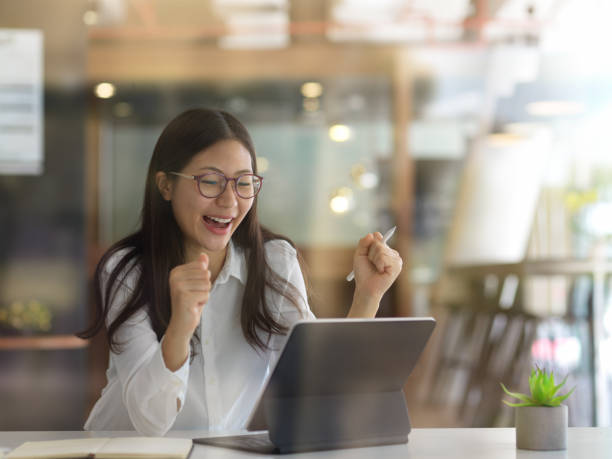 istock Businesswoman getting exited about the work project in office room 1279275083