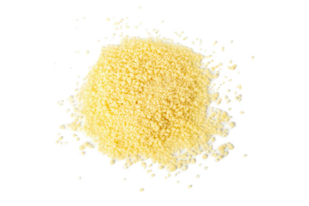 istock Bunch of raw couscous isolated on white background 1279277172