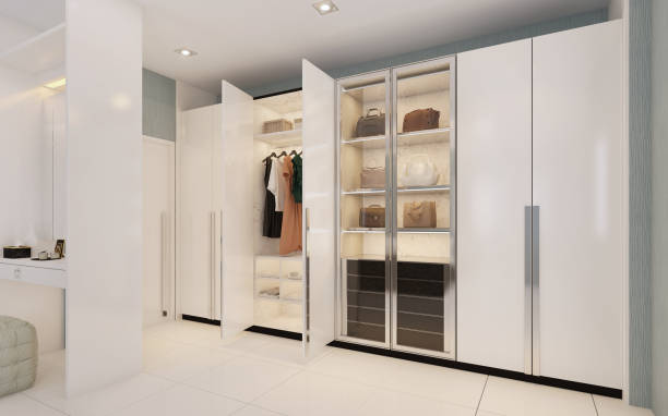 istock Modern style walk in closet.White wardrobe.3d rendering 1279278450