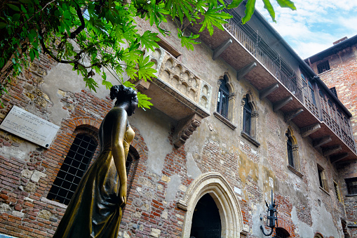 Facade with balcony of historical buildings in the city of Padua in Italy. Typical wall view with architectural details. Brickwork.Travel destination in Italy concept