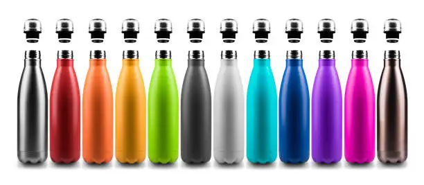 Photo of Set of colorful reusable steel stainless thermo water bottles with bottle caps, isolated on white background.