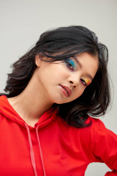 istock Glamour fashion model with bright make-up, at studio. 1279280518