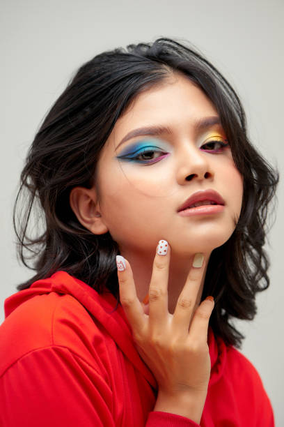 istock Fashion portrait of model with creative make up posing in studio 1279280775