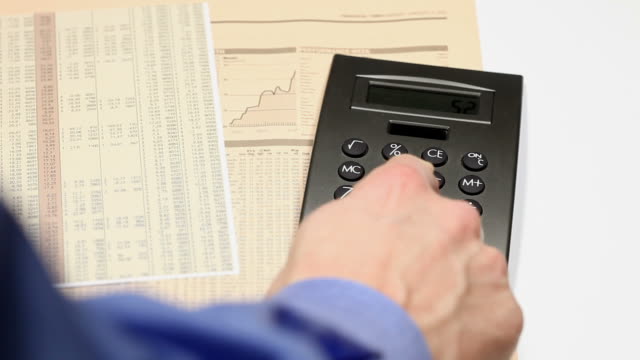 financial clip - using a calculator
