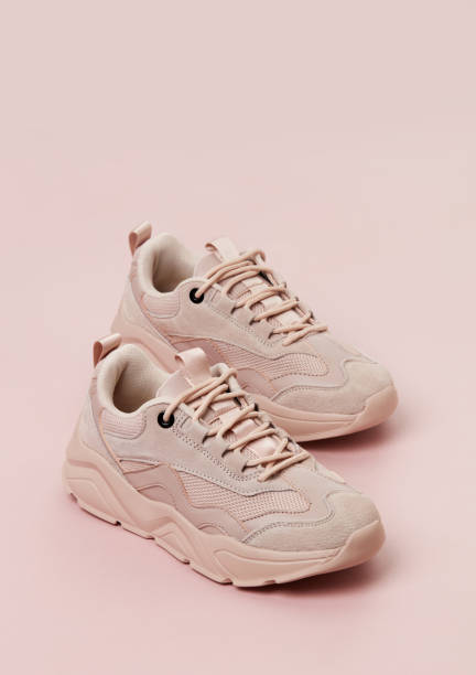 istock Casual shoes on light pink background 1279285518