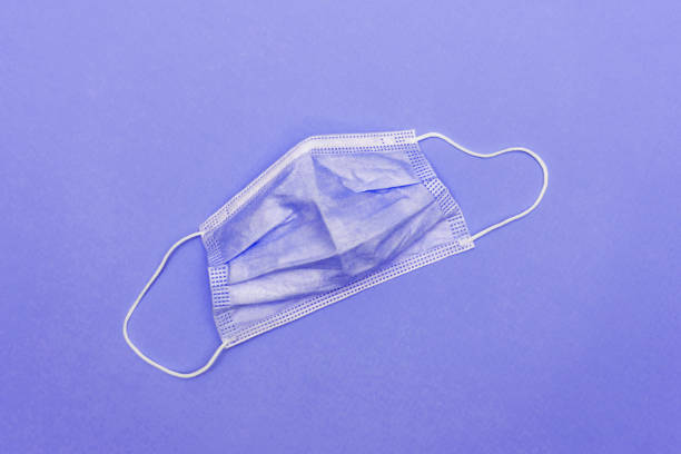 Disposable surgical face mask stock photo