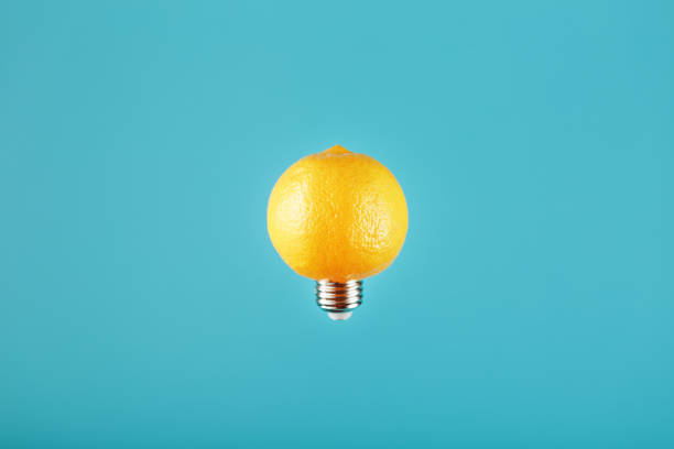 istock Lemon as a light bulb in levitation on a blue background. The conceptual idea 1279287161