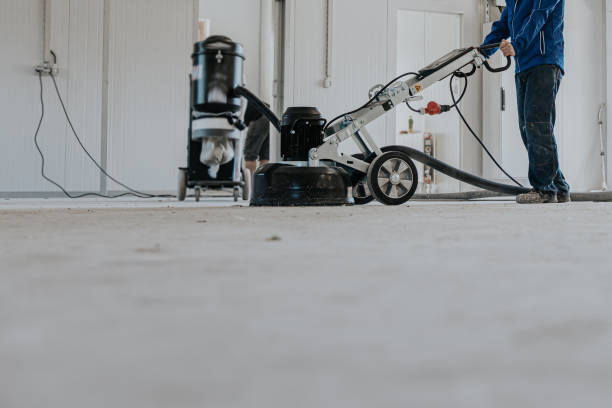 Construction worker using machine polishing surface floor smoothing and finishing hardener or epoxy concrete in the factory. Construction worker using machine polishing surface floor smoothing and finishing hardener or epoxy concrete in the factory. hardener stock pictures, royalty-free photos & images