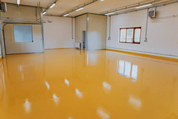istock New epoxy floor in warehouse factory. Construction series 1279290183