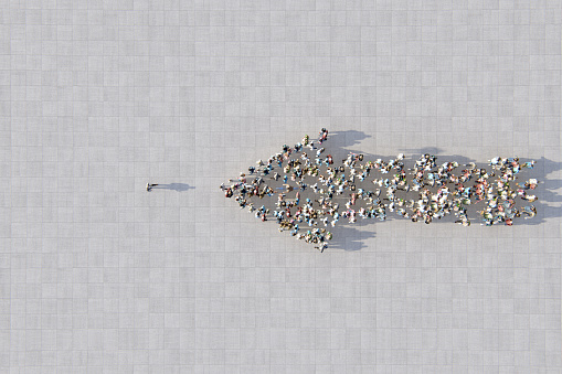Standing alone against the crowd. Aerial view. 3d render