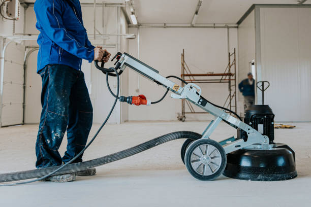 Construction worker using machine polishing surface floor smoothing and finishing hardener or epoxy concrete in the factory. Construction worker using machine polishing surface floor smoothing and finishing hardener or epoxy concrete in the factory. hardener stock pictures, royalty-free photos & images