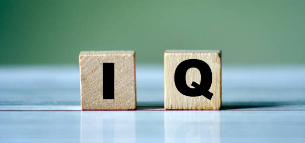 istock IQ word concept on wooden cube.  Intelligence symbol. Brain or talent background idea 1279290702