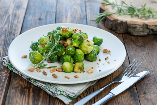 stewed brussels sprouts with herbs close-up