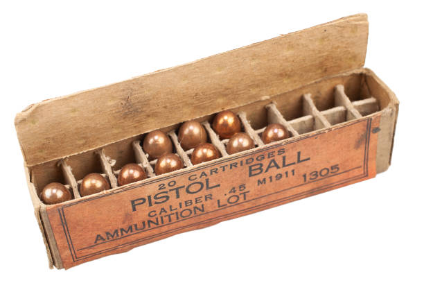 istock Pistol ball caliber .45 M1911 box with cartridges 1279305285