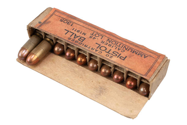istock Pistol ball caliber .45 M1911 box with cartridges 1279305345