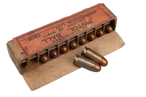 istock Pistol ball caliber .45 M1911 box with cartridges 1279305378
