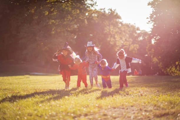 istock Kids running trough nature. 1279306639