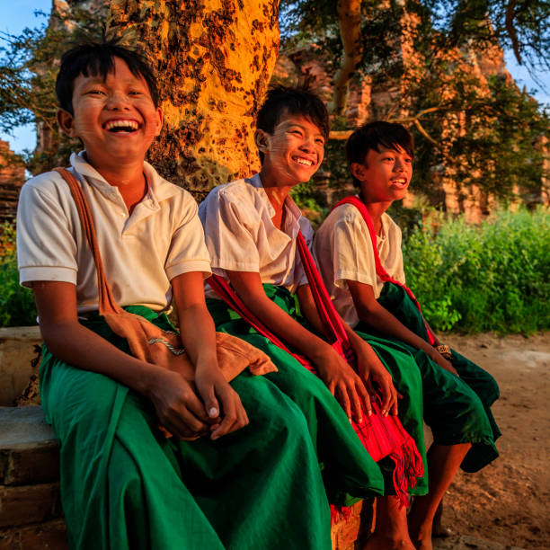istock Young Burmese schoolboys resting in Bagan, Myanmar 1279307559