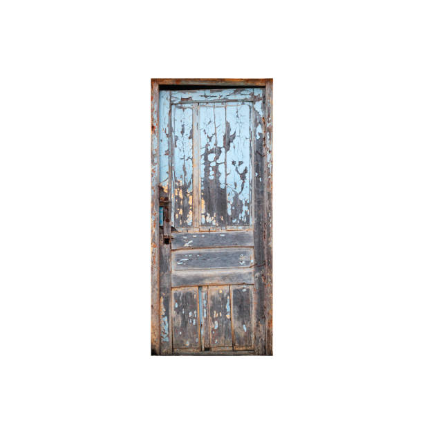 istock Old wooden door with blue peeling paint isolated 1279310069