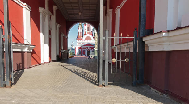 Entrance to the territory of the Kazan Monastery of the city of Tambov. Entrance through the bell tower to the territory of the Kazan Monastery of the city of Tambov on a sunny day tambov oblast photos stock pictures, royalty-free photos & images